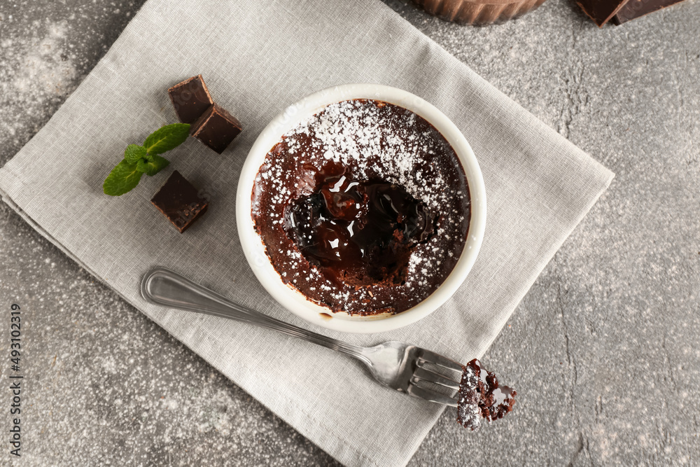 Ramekin with tasty lava cake on grunge background Stock Photo Adobe Stock