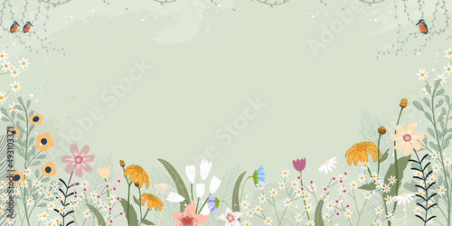 Photography Spring green background with cute birds and tiny wild flowers blooming on border