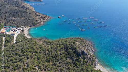 Aerial drone photo of small fish farming unit in calm sea of Salamina island, Saronic Gulf, Greece
