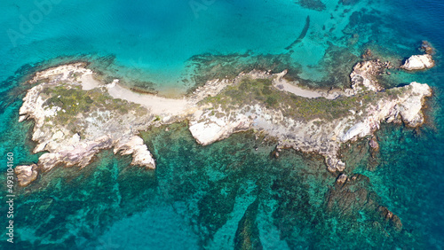 Fototapeta Naklejka Na Ścianę i Meble -  Aerial drone photo of small paradise tropical exotic islands covered in limestone with turquoise crystal clear sea