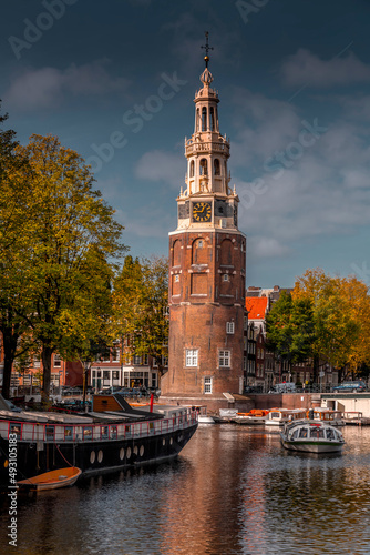 Photography The Montelbaanstoren tower on Oudeschans canal in Amsterdam, Netherlands