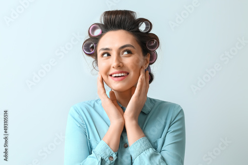 Beautiful young woman in ha...
