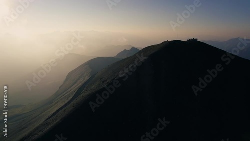 Dark and Higest Peaks of French Alps Mountains at Sunrise photo