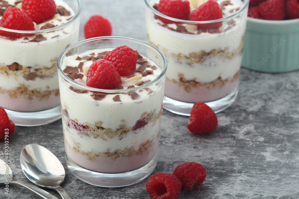Granola with yogurt trifles with raspberry