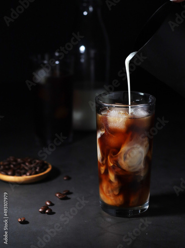 Cold coffee with ice in low key