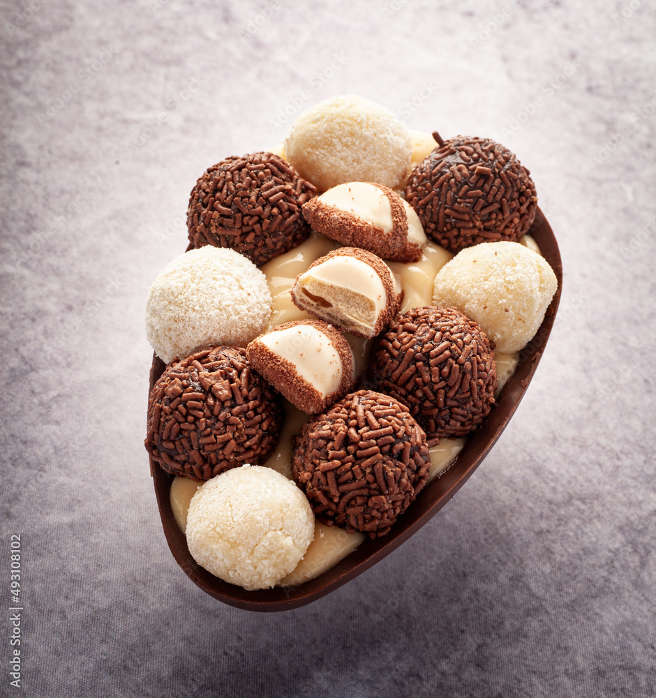homemade easter egg with chocolate, brigadeiro and nest milk. homemade easter egg with chocolate, brigadeiro and nest milk.