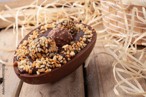 homemade easter egg with chocolate and peanuts photo