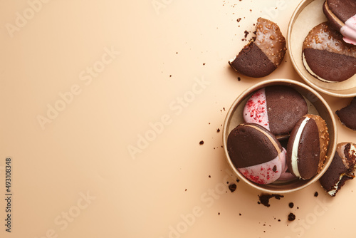 Whoopie pie desserts in boxes on beige background