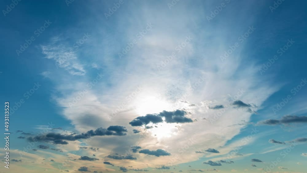 Time lapse of the Sun coming out of the clouds. Time-lapse of fast moving clouds in a beautiful sunny day. Time lapse of the Sun coming out of the clouds. Time-lapse of fast moving clouds in a beautiful sunny day.