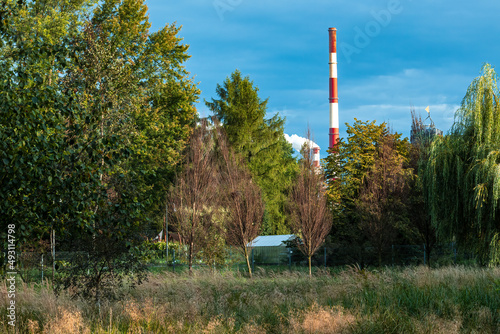 Wallpaper Mural Park Lotnikow Polskich and the white and red chimney, Krakow, Poland Torontodigital.ca