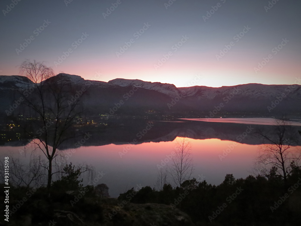 Beautiful sunset view behind the mountains Beautiful sunset view behind the mountains