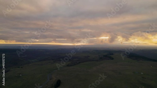 Cloudy Sky Over Lowland by Drone in Autumn at Sunset