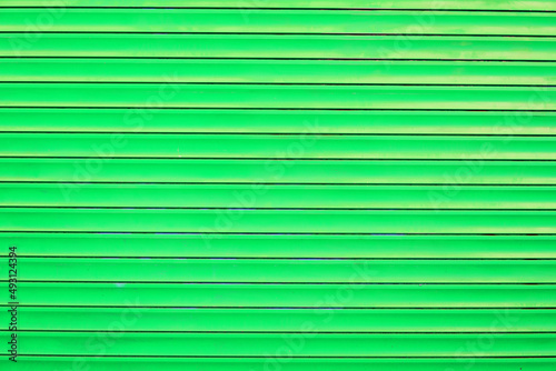 Green metal door - abstract background