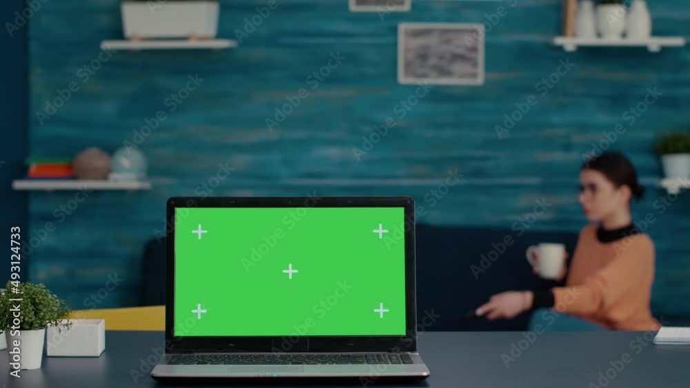 Modern laptop with green screen template on desk at home, online school class with isolated copy space, blank mockup background and chroma key on display. Computer with technology. Modern laptop with green screen template on desk at home, online school class with isolated copy space, blank mockup background and chroma key on display. Computer with technology.