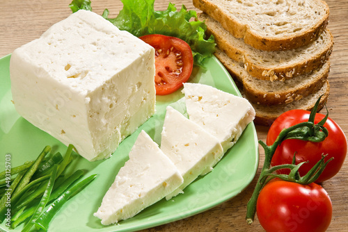 feta greek turkish cheese on plate with tomatoes