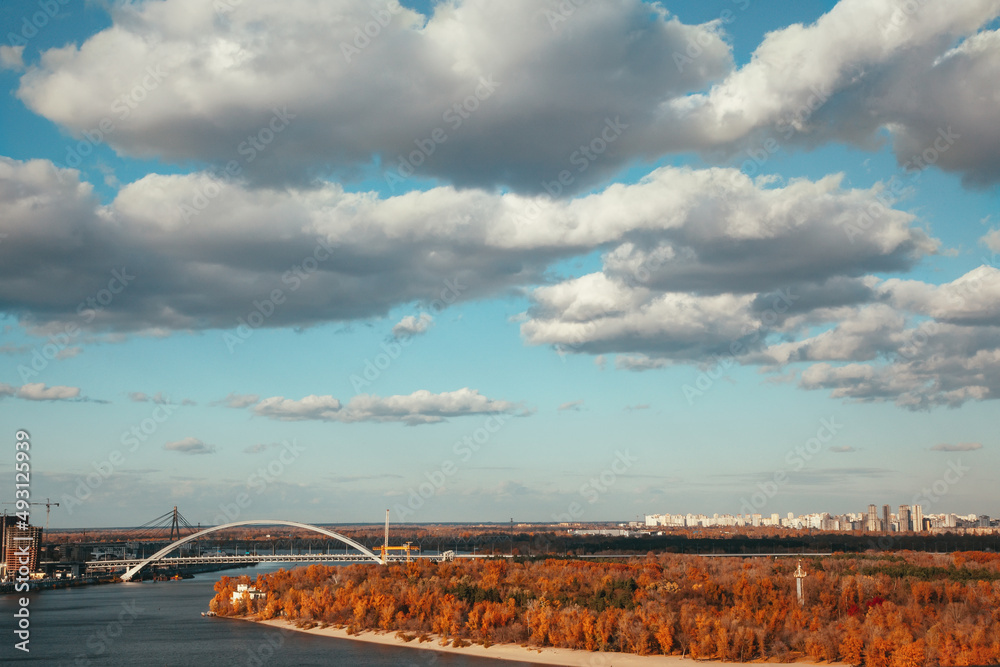 Panoramic view of the cityscape with views of the river and the bridge