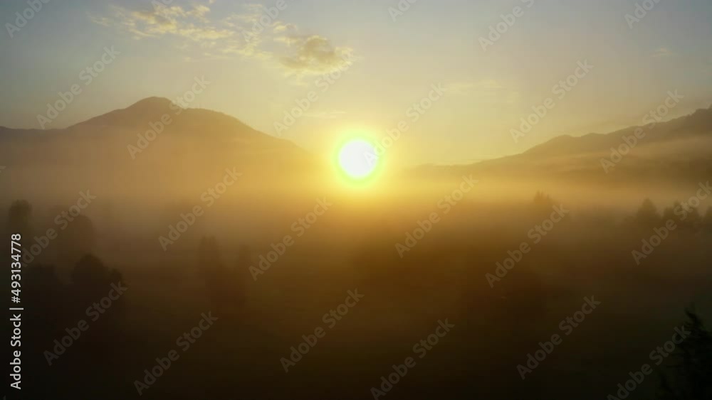 Drone Over Ethereal Misty Landscape Of Zell Am See Towards Sunrise Drone Over Ethereal Misty Landscape Of Zell Am See Towards Sunrise