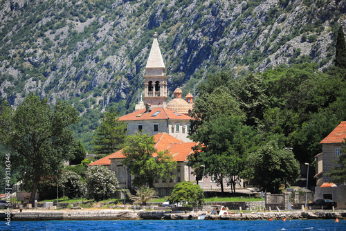 Church on the shore near the mountains in Kotor city