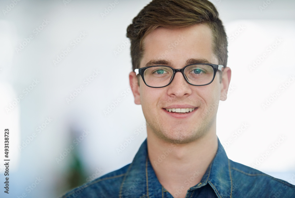 Hes got a strong work ethic. Portrait of a handsome young office worker. Hes got a strong work ethic. Portrait of a handsome young office worker.