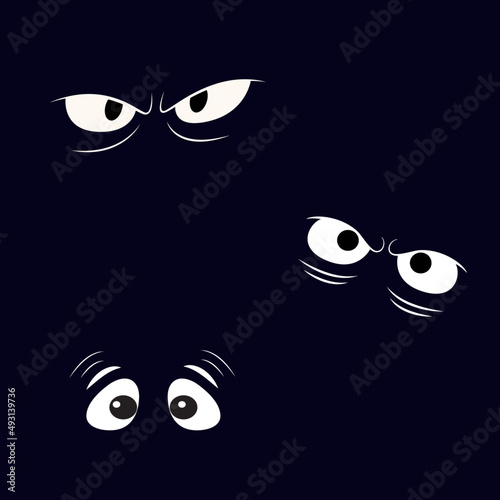 Spooky eyes staring out from the dark