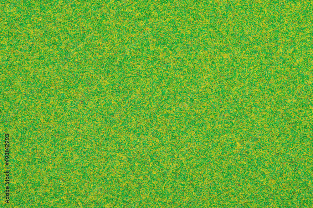 Realistic simulation of green grass. Craft paper. Artificial lawn. Fake