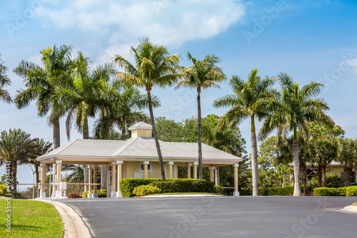Entrance to gated community neighborhood in Naples, Florida © marchello74