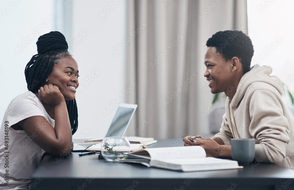 When your crush turns into your coworker. Shot of a happy young couple working from home. When your crush turns into your coworker. Shot of a happy young couple working from home.