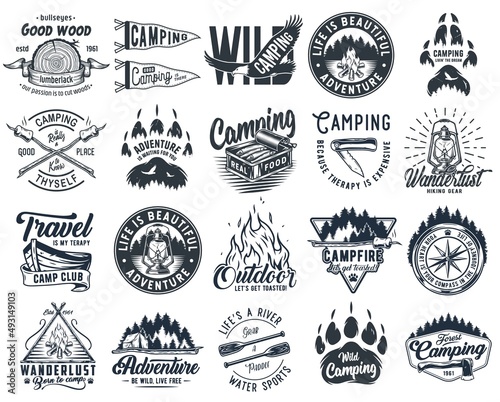 Set of monochrome camping and travel emblems, including campfire, flag, wood, lantern, forest