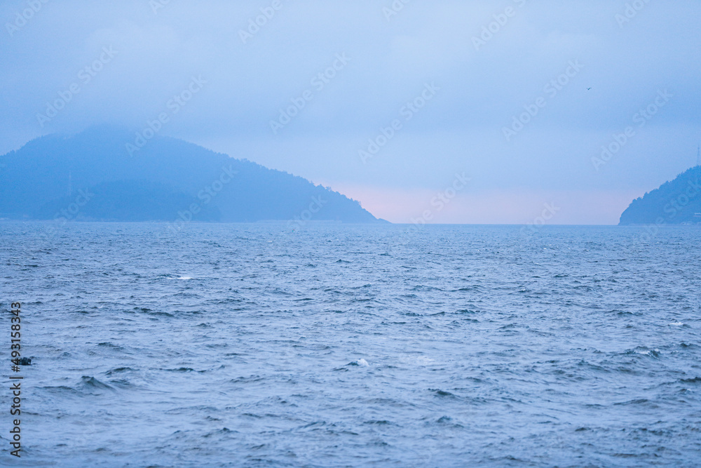 the horizon of the sea seen in the distance the horizon of the sea seen in the distance