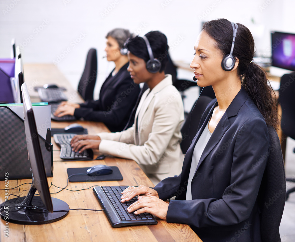 Theyve always provided great service. Cropped shot of three female call center representatives wearing headsets. Theyve always provided great service. Cropped shot of three female call center representatives wearing headsets.