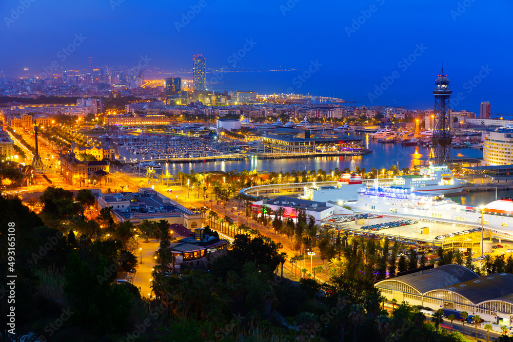 Aerial view of the evening city of Barcelona, the capital of the autonomous region of Catalonia, Spain