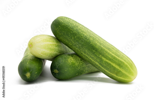 group of cucumbers isolated on white background, selective focus
