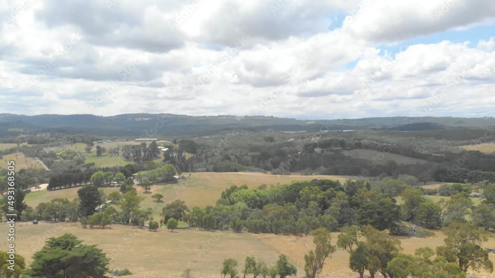 Aerial shot raising up over farmlands in the dandenong ranges Australia. Aerial shot raising up over farmlands in the dandenong ranges Australia.