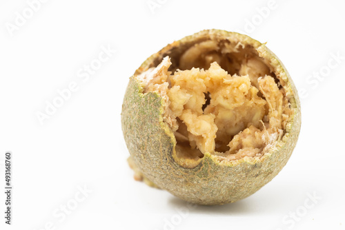 wood apple or beal fruit slices over on white background