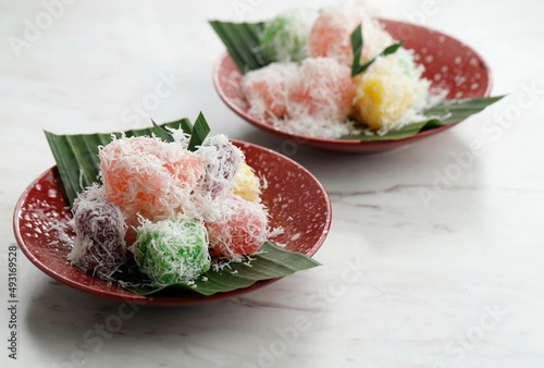 Ongol Ongol Singkong, Indonesian Traditional Steamed Cake Made From Cassava with Garted Coconut Coating. One Various of Jajanan Pasar photo