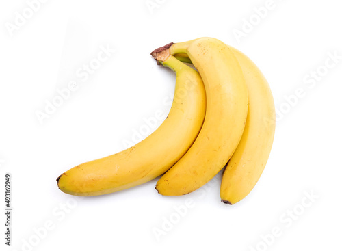 Three ripe yellow bananas on a white background.