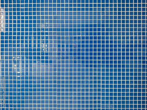 Blue mosaic tiles texture background.