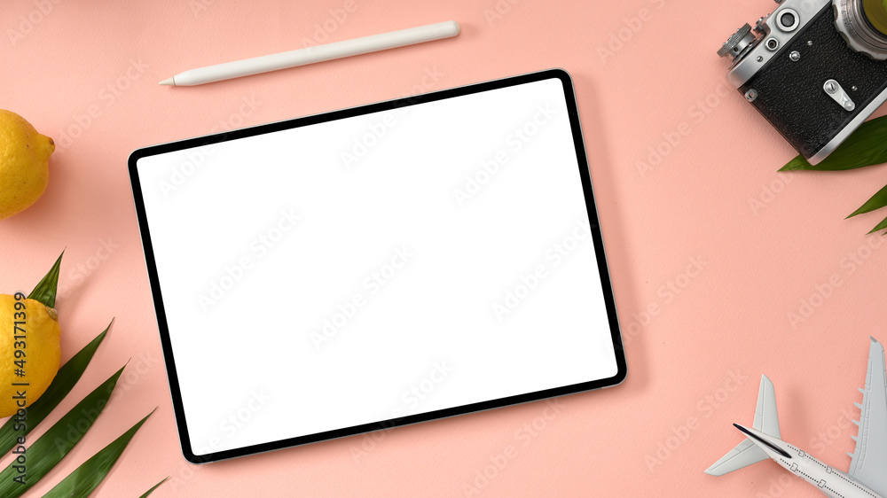 Tablet computer mockup on pink background. summer background Tablet computer mockup on pink background. summer background