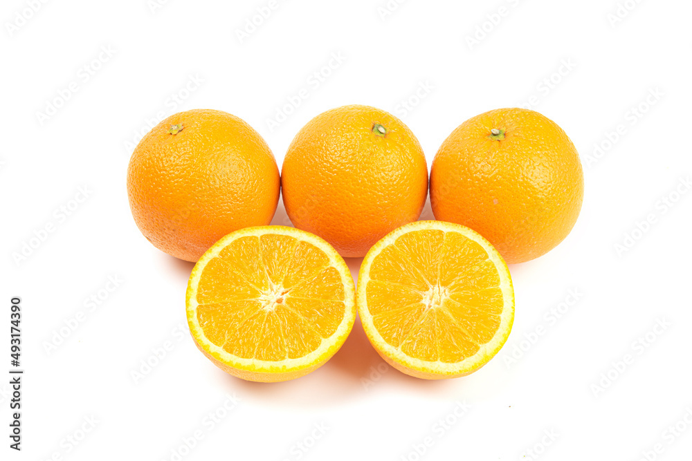 Orange fruit with cut in half isolated on white background. Orange fruit with cut in half isolated on white background.