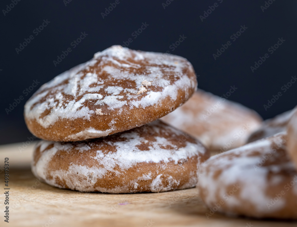 iced sugar gingerbread on a cutting board iced sugar gingerbread on a cutting board