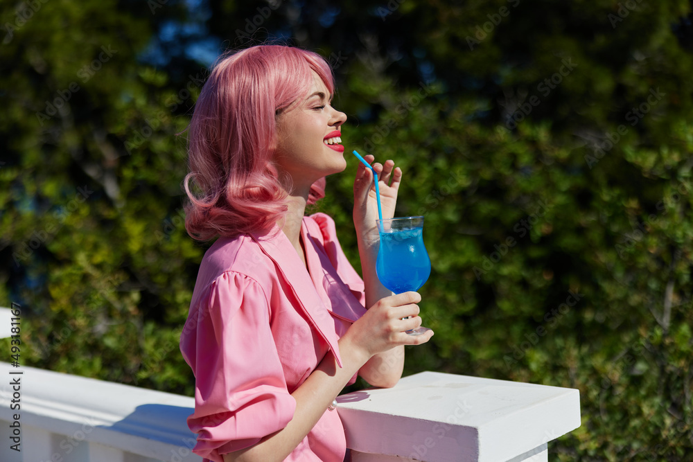 Fototapeta premium attractive woman happiness vacation sunny summer cocktail unaltered