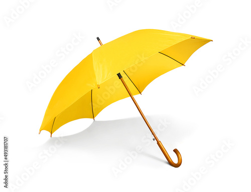 Yellow umbrella isolated on a white background