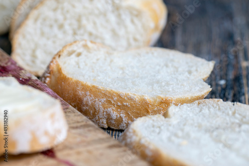 wheat baguette cut into pieces for cooking sandwiches