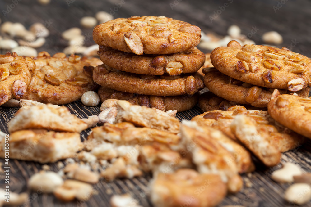 wheat-oatmeal cookies with peanuts, closeup wheat-oatmeal cookies with peanuts, closeup