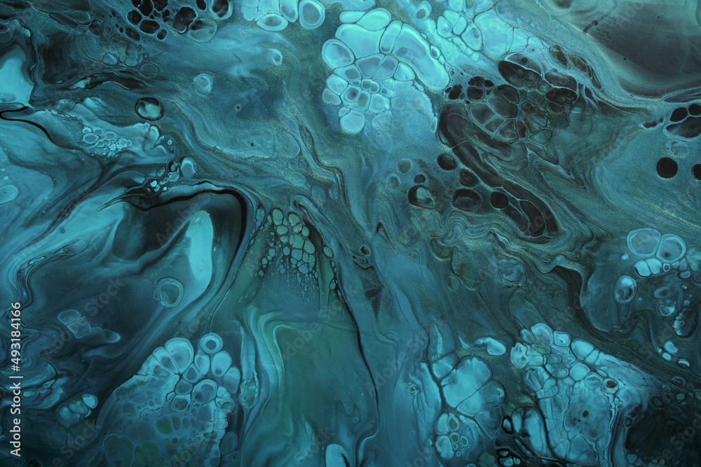 Fluid Art. Fluorescent blue waves with golden particles on black background. Marble effect background or texture Fluid Art. Fluorescent blue waves with golden particles on black background. Marble effect background or texture