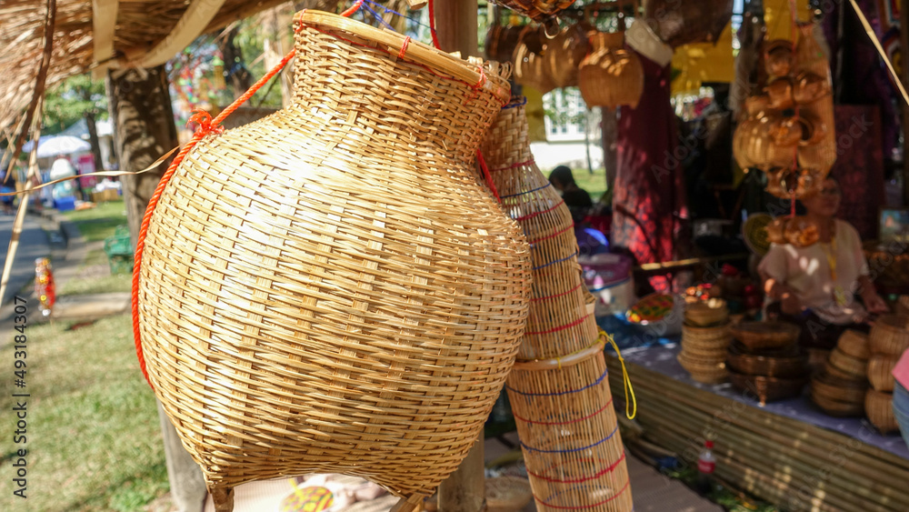 Bamboo baskets are hung in front of the shop.