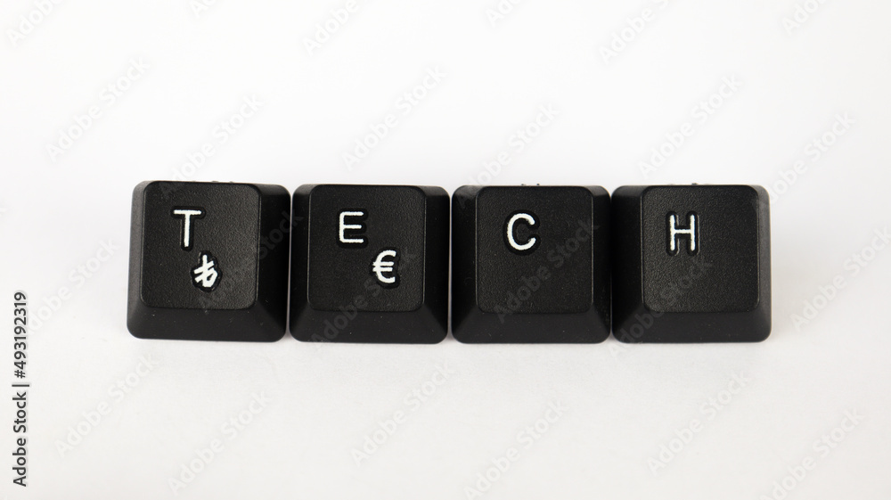Tech text created with keyboard keys isolated on white background, white tech letters on black keyboard, top view