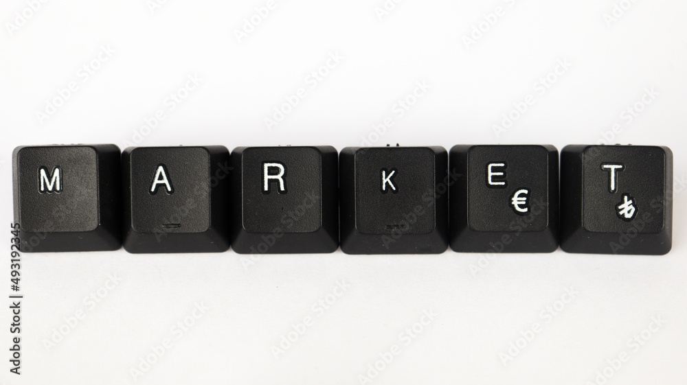 Market text created with keyboard keys isolated on white background, white market letters on black keyboard, top view Market text created with keyboard keys isolated on white background, white market letters on black keyboard, top view
