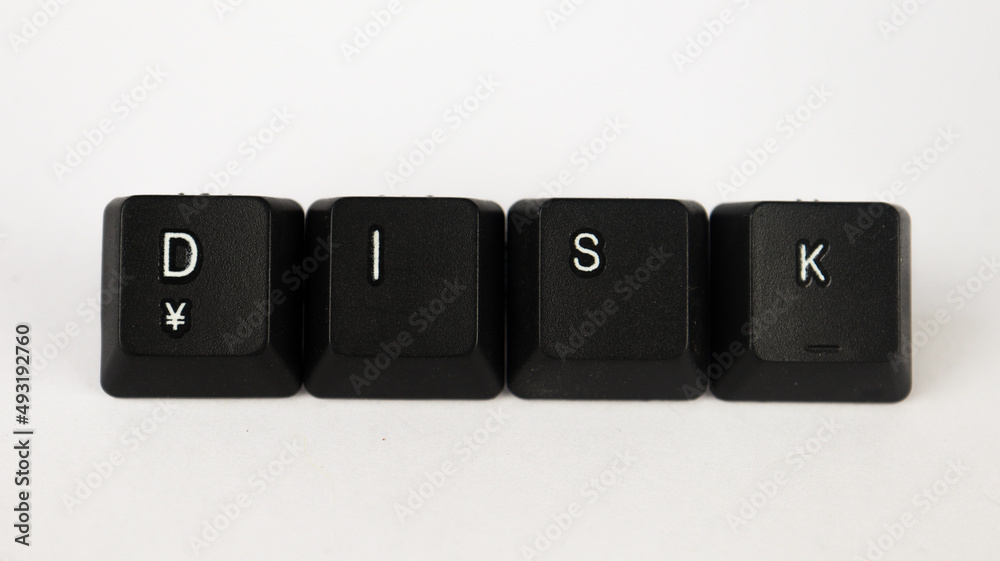 Dısk text created with keyboard keys, isolated on white background, computer terminology Dısk text created with keyboard keys, isolated on white background, computer terminology
