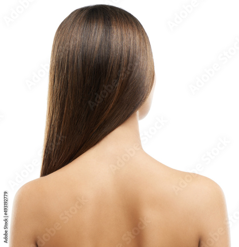 Haircare perfected. Rear view of a young woman with long, luxurious hair isolated on a white background.